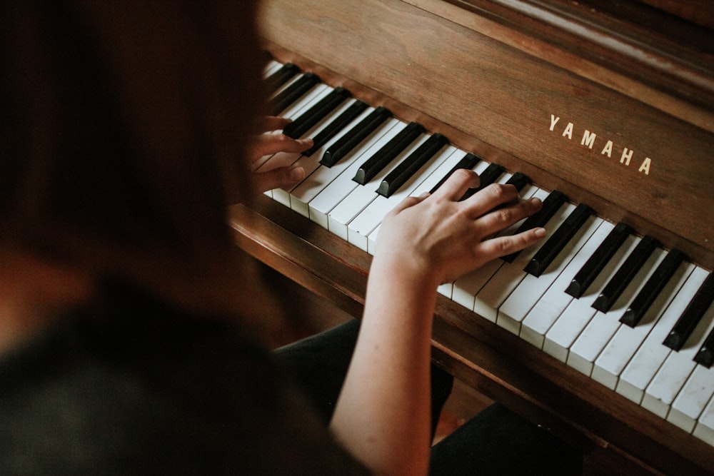 Concert Grand Piano Keys and Musician Hands